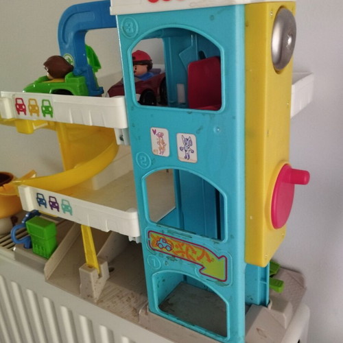 Fisher Price garage toy used with 2 figures