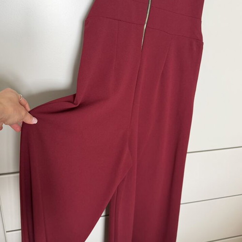 Burgundy jumpsuit with ruffles by Moda new, one size
