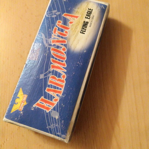 Flying Eagle harmonica like new
