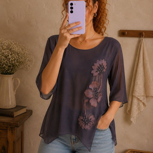 Black transparent blouse with black flower design and strass used, size L