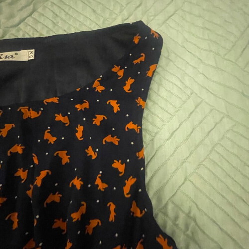 Vintage sleeveless mini dress like new with blue and orange prints