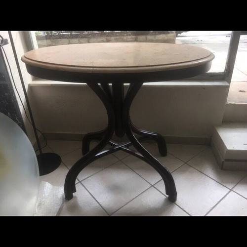 Vintage table with bent wood and oval salmon-pink marble used