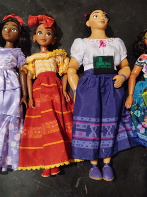 Disney Store Encanto dolls like new, all together