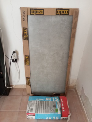 Ceramic tiles pack of 2 new with adhesive 1.44 sqm total