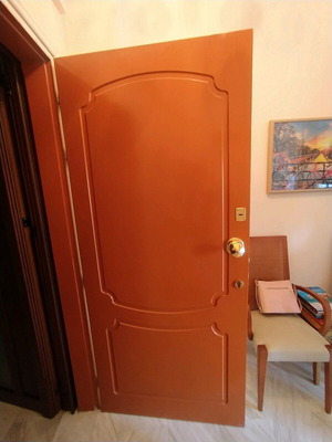 Lacquered entrance door used, terracotta exterior, white interior
