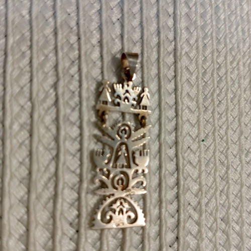 Mexican silver pendant like new with angel and ethnic design