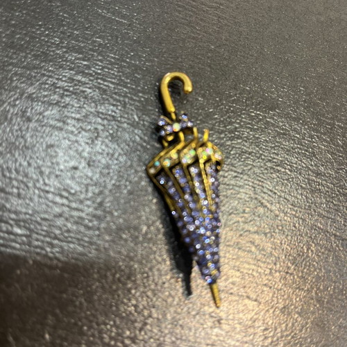 Umbrella-shaped brooch with purple crystals and antique gold metal like new