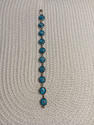 Silver 925 bracelet with blue evil eyes like new