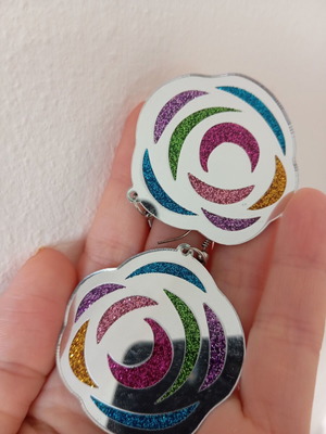 Plastic earrings used with glitter