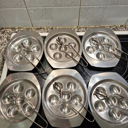 Escargot set with 6 plates, tongs & forks like new