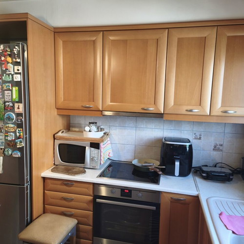 Solid oak kitchen cabinets with glass, used, including appliances