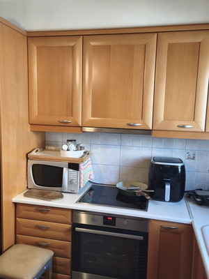 Solid oak kitchen cabinets with glass, used, including appliances