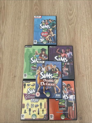 Sims 2 PC game set like new, authentic discs with expansion packs