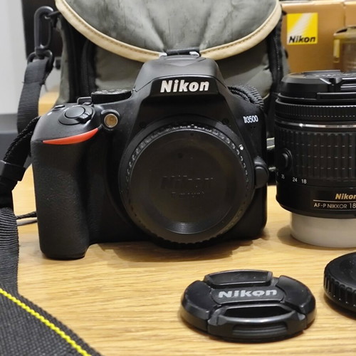 Nikon D3500 DSLR camera body with 3 lenses and accessories