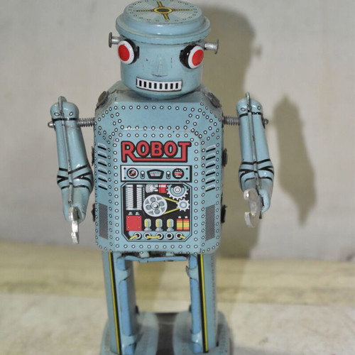 Vintage tin wind-up robot used, blue color
