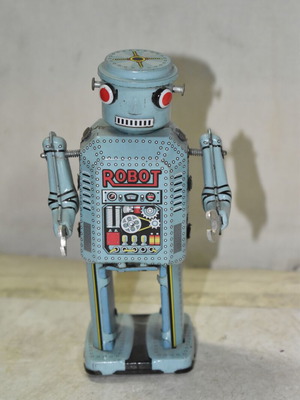 Vintage tin wind-up robot used, blue color