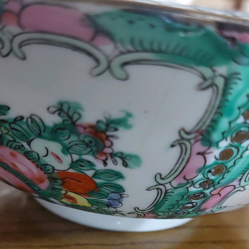 Porcelain cup decorated with Chinese style designs like new