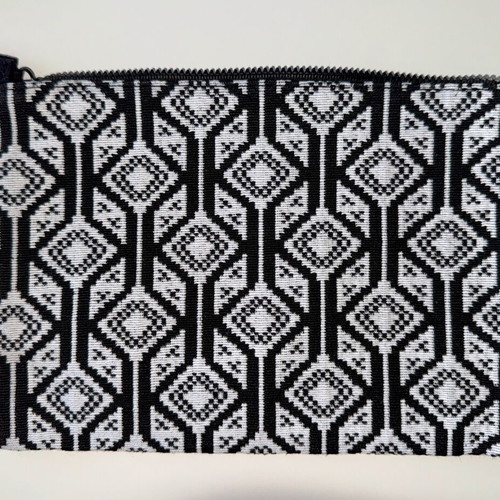 Kerastase fabric toiletry bag like new with geometric patterns in black and white
