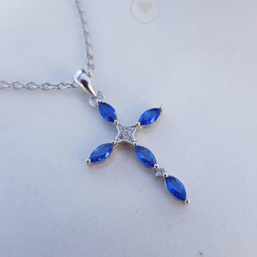 Women's silver cross pendant with blue cubic zirconia