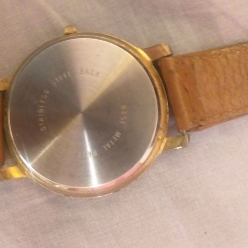 Wristwatch with planet design used, brown leather strap