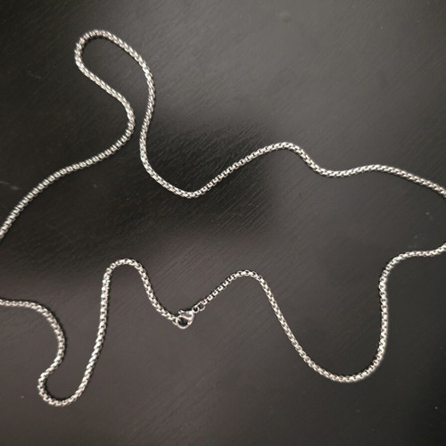 Silver necklace with geometric pendant and black stone, like new