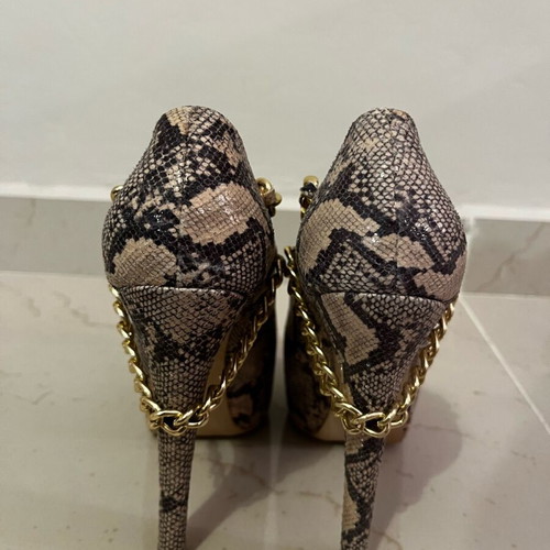 High leopard print pumps new, size 37, 15 cm heel