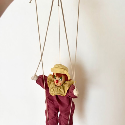 Vintage clown marionette with porcelain head and wooden control cross, like new