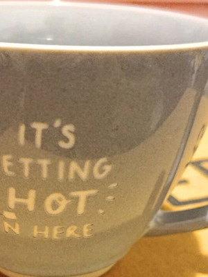 Mug with It's Getting Hot In Here design Marks & Spencer new