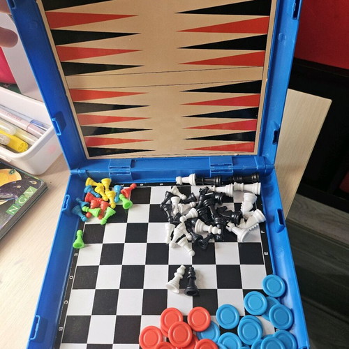Portable multiple board game like new, closes like a suitcase