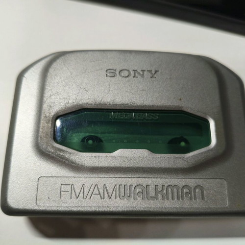 Sony Walkman WM-FX491 cassette player used with original headphones
