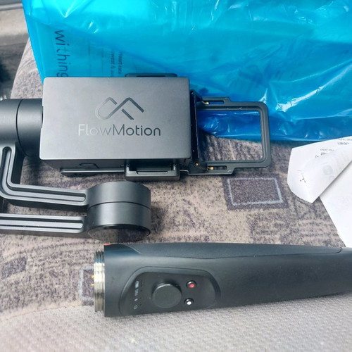 Flowmotion mobile phone stick in excellent condition with 2 batteries