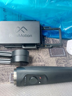Flowmotion mobile phone stick in excellent condition with 2 batteries