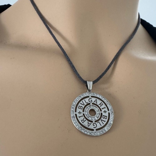 Bvlgari necklace with leather cord gray like new
