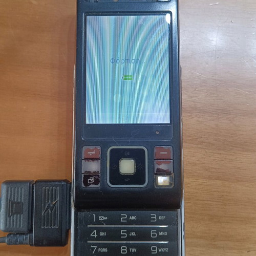 Sony Ericsson C905 used, non-working, with charger and USB cable