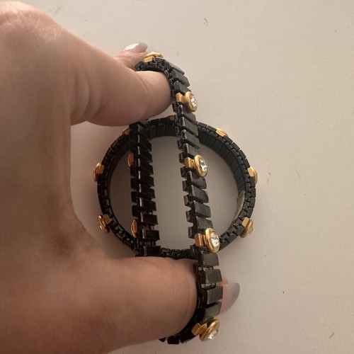 Elastic metallic bracelet set used, black and silver