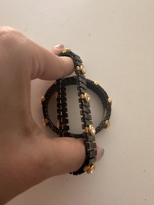 Elastic metallic bracelet set used, black and silver