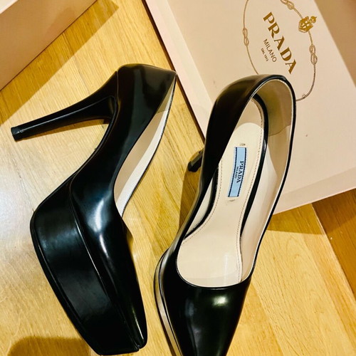Prada black leather high platform pumps like new