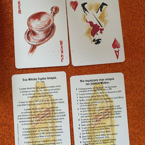 Johnnie Walker collectible playing cards in metal box used