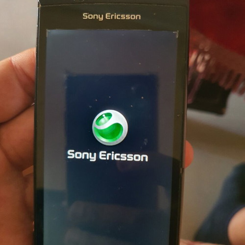 Sony Ericsson Xperia vintage used smartphone with memory card