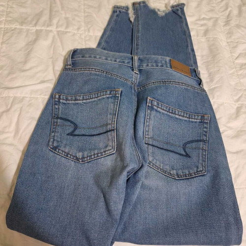 American Eagle women's blue mom jeans like new with knee rips and frayed hems