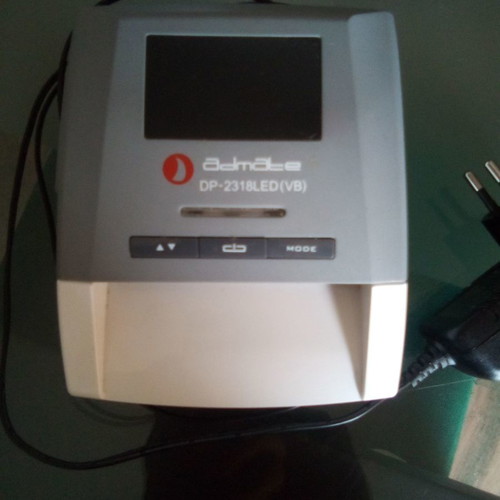 Admate counterfeit banknote detector used