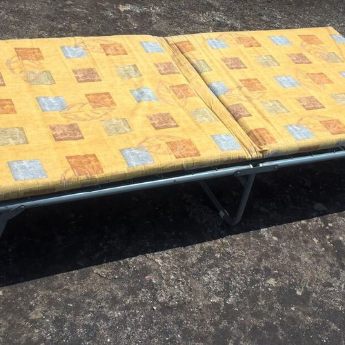 Metal folding bed with mattress used, sturdy and comfortable