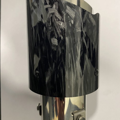 Universal exhaust tip with carbon fiber design