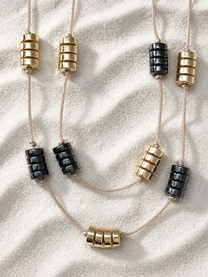 Handmade double-strand necklace with cord and hematite stones new, black and gold