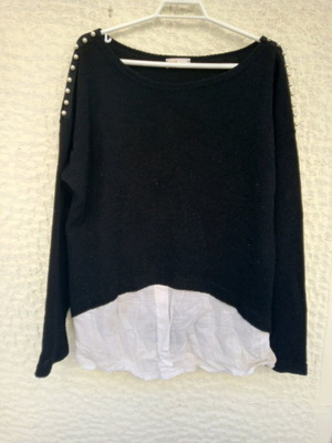 Black sweater with pearls on shoulders and white detail used