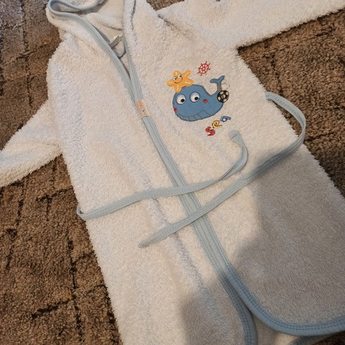 Baby bathrobe like new, white with blue details and belt
