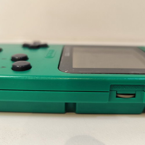 Game Boy Pocket Green console used with Test Drive 6 game