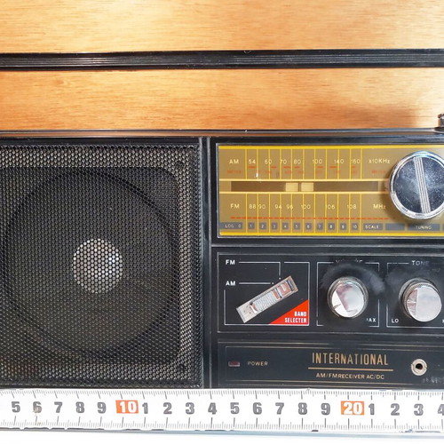 International and All Weather transistor radios used, portable analog