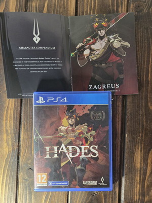 Hades PS4 game with booklet