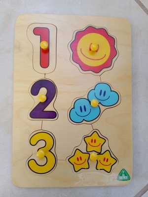 Wooden number peg puzzle used